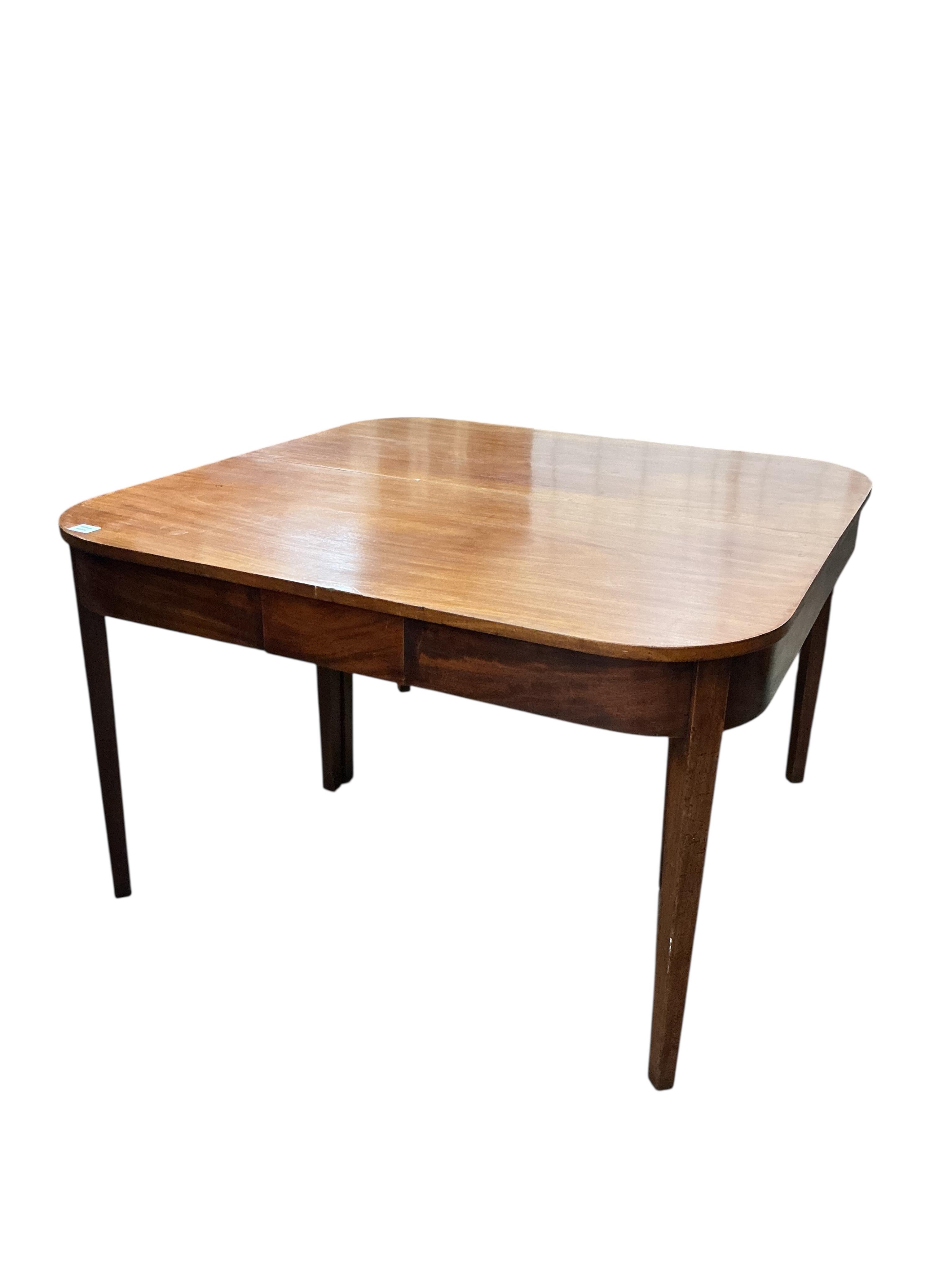 A George III mahogany 'D' end extending dining table, 170cm extended, one spare leaf, no clips for the leaf, depth 120cm, height 73cm